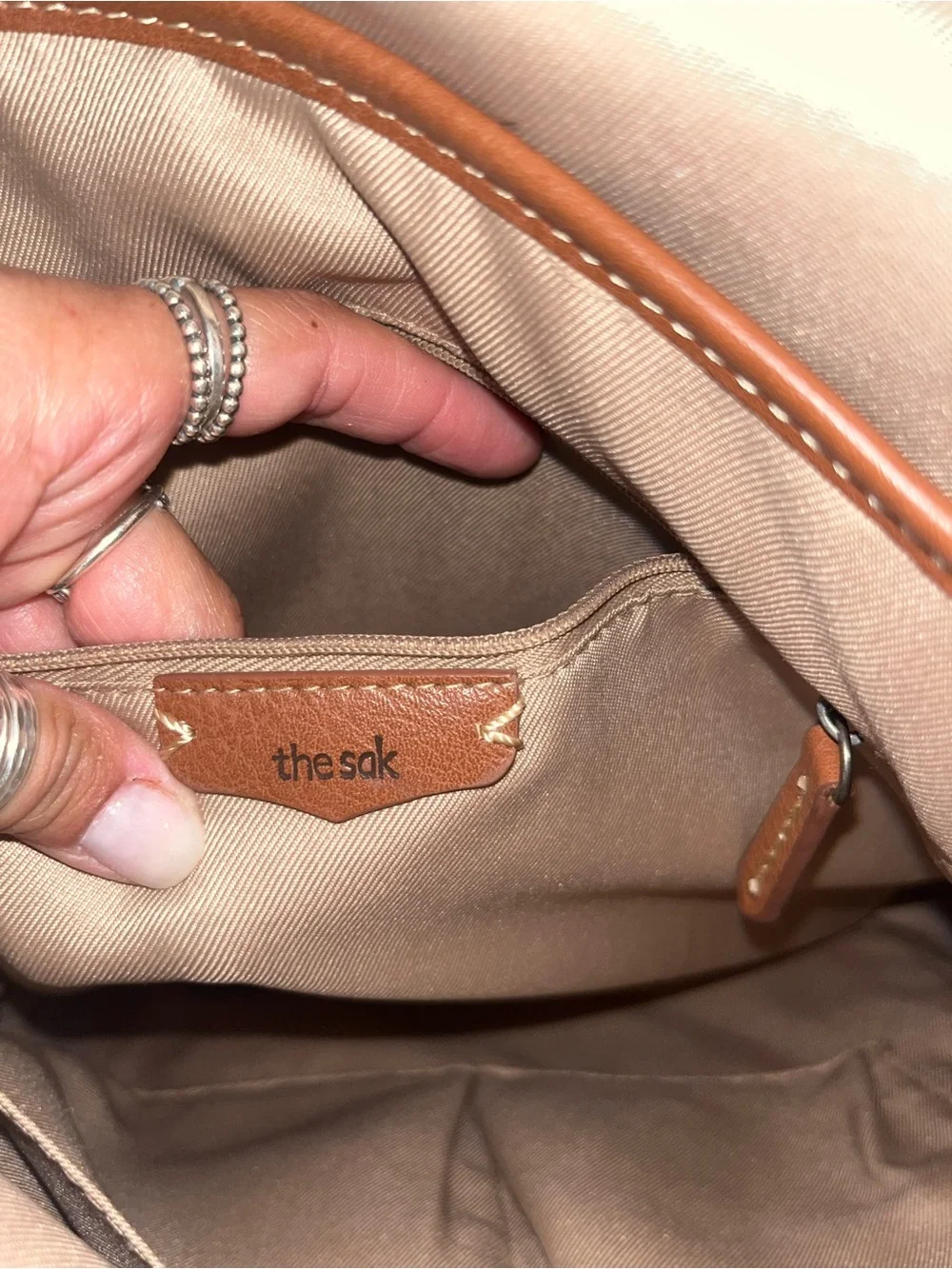 The Sak Metallic Gray Embossed Leather Backpack
